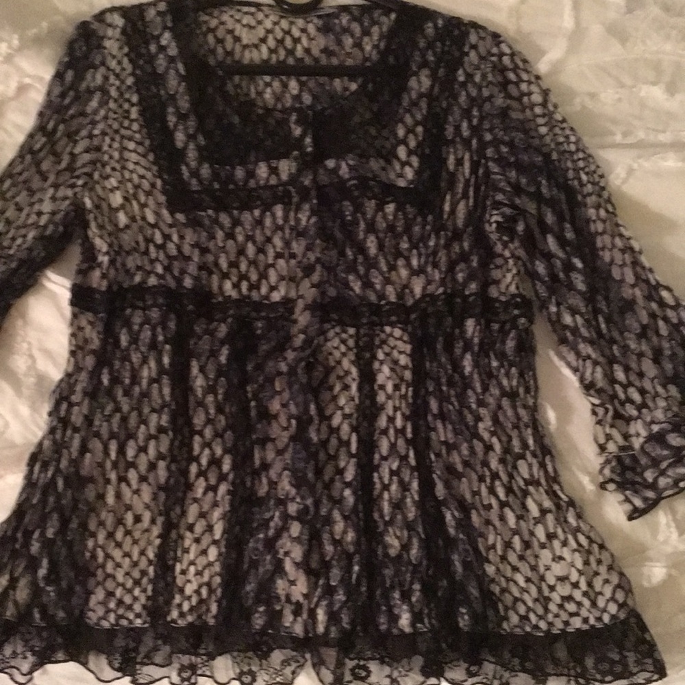 Lacy peasant top stretches to fit you perfectly